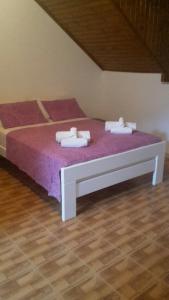 Cama ou camas em um quarto em Apartment Tonka's Terrace