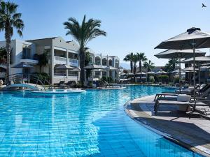 The swimming pool at or close to Pelagos Suites Hotel & Spa
