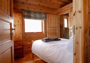 Postel nebo postele na pokoji v ubytování Pentland Lodge
