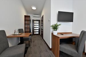 TV a/nebo společenská místnost v ubytování Hotel Terminal