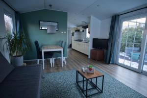 Zona d'estar a chalet hensbroek