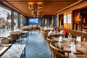 En restaurang eller annat matställe på Eiger Mürren Swiss Quality Hotel