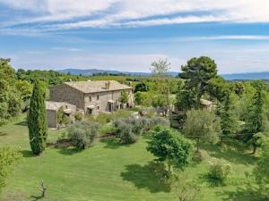 an aerial view of an old stone house in a field at Il Tiglio in Orvieto