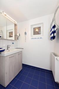 Koupelna v ubytování Ferienhaus Nordseeschnecke