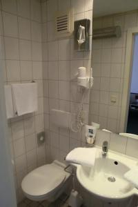 Kylpyhuone majoituspaikassa Hotel Eigen