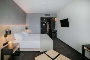 Posteľ alebo postele v izbe v ubytovaní B&B HOTEL Warsaw East