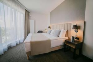 Posteľ alebo postele v izbe v ubytovaní B&B HOTEL Warsaw East