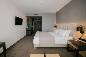 Posteľ alebo postele v izbe v ubytovaní B&B HOTEL Warsaw East