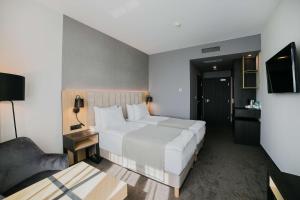 Posteľ alebo postele v izbe v ubytovaní B&B HOTEL Warsaw East