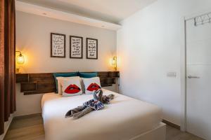 Posteľ alebo postele v izbe v ubytovaní Relaxing retreat in Maspalomas Lago - Fully renovated bungalow + 32 fotografií