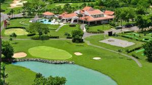 an aerial view of the golf course at the resort at Villa Metro Country Club in Juan Dolio