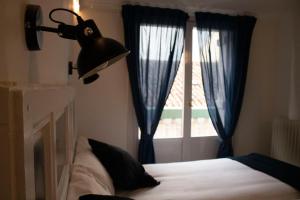 Cama o camas de una habitación en Hotel Alda Jolio Jaca