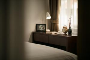 تلفاز و/أو أجهزة ترفيهية في Poonsa Duy Tan Hotel and Serviced Apartment