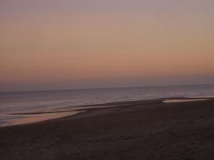 a view of the beach at sunset at The Ramblers in Trusthorpe