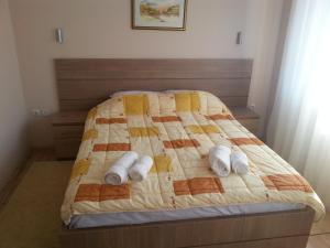 Posteľ alebo postele v izbe v ubytovaní Garni Hotel Crystal Ice