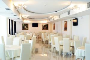 TV a/nebo společenská místnost v ubytování Garni Hotel Crystal Ice