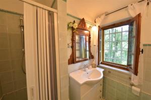 Koupelna v ubytování Stalla + 22 fotografií