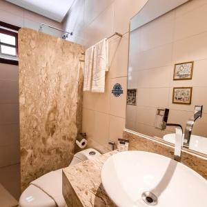 Um banheiro em Terra dos Diamantes Hotel