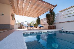 The swimming pool at or close to Casa Riu Avall
