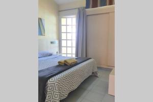 Posteľ alebo postele v izbe v ubytovaní Tisalaya Park stay, cosy apartment in Maspalomas
