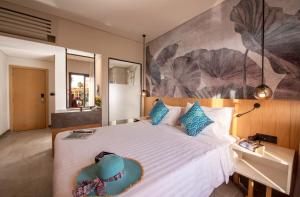 Ein Bett oder Betten in einem Zimmer der Unterkunft Three Corners Rihana Resort El Gouna