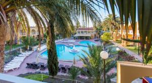 Bazén v ubytovaní Tisalaya Park stay, cosy apartment in Maspalomas alebo v jeho blízkosti