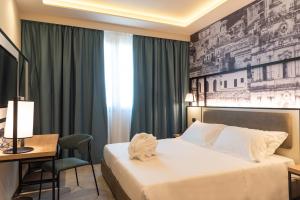 Modica Boutique Hotel客房内的一张或多张床位
