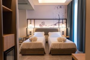 Modica Boutique Hotel客房内的一张或多张床位