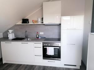 Kuchyň nebo kuchyňský kout v ubytování City Pension Stadtlohn + 19 fotografií