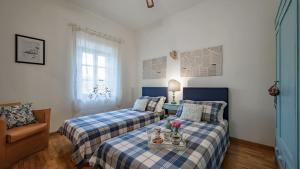 Ένα ή περισσότερα κρεβάτια σε δωμάτιο στο Bellosguardo +35 φωτογραφίες