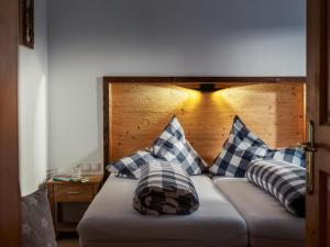 Postel nebo postele na pokoji v ubytování Haus Ausblick