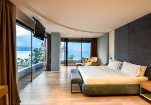Кровать или кровати в номере Yacht Hotel +37 фотографий