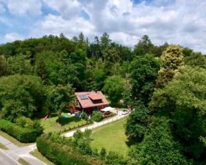 an aerial view of a house in the woods at Ferienwohnung im alten Forsthaus in Bermatingen
