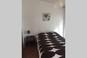 Postel nebo postele na pokoji v ubytování Gîte 2 pièces au calme