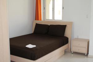 Cama ou camas em um quarto em Piscadera Seaview Apartments