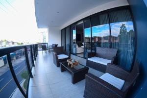 A balcony or terrace at The Luxury Apartment