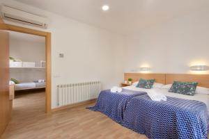 Postel nebo postele na pokoji v ubytování Hostal La Numantina