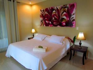 Voodi või voodid majutusasutuse Tamarindo Condo 206 Matapalo toas
