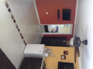 a stairway with a sewing machine in a room at Haynes Cay View in San Andrés