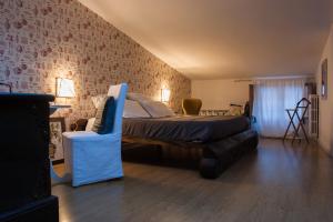 A bed or beds in a room at B&B La Cuntana