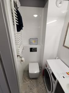Kúpeľňa v ubytovaní Apartament Bałtycka + 21 fotografií