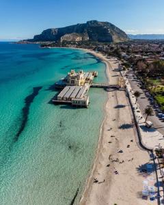 an aerial view of a beach with a boat in the water at Guest House Antichi Ulivi in Mondello