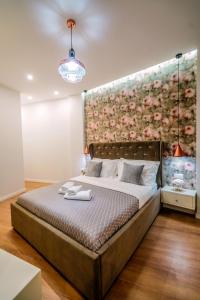 Postel nebo postele na pokoji v ubytování Hotel Capital Inn Tirana