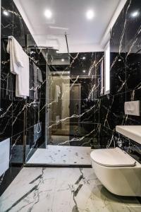 Koupelna v ubytování Hotel Capital Inn Tirana + 26 fotografií