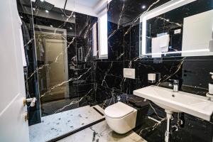 Koupelna v ubytování Hotel Capital Inn Tirana