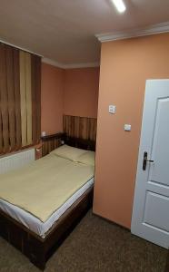 Llit o llits en una habitació de Motel Maria
