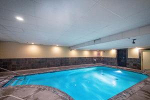 a large blue swimming pool in a building at Oceanfront Contemporary in Lincoln City