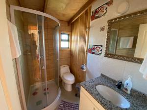 Koupelna v ubytování Cabañas y Hostal Isla Mágica