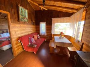 Posezení v ubytování Cabañas y Hostal Isla Mágica