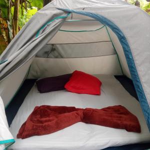 Säng eller sängar i ett rum på Camping Trópico de Capricórnio - Ilhabela